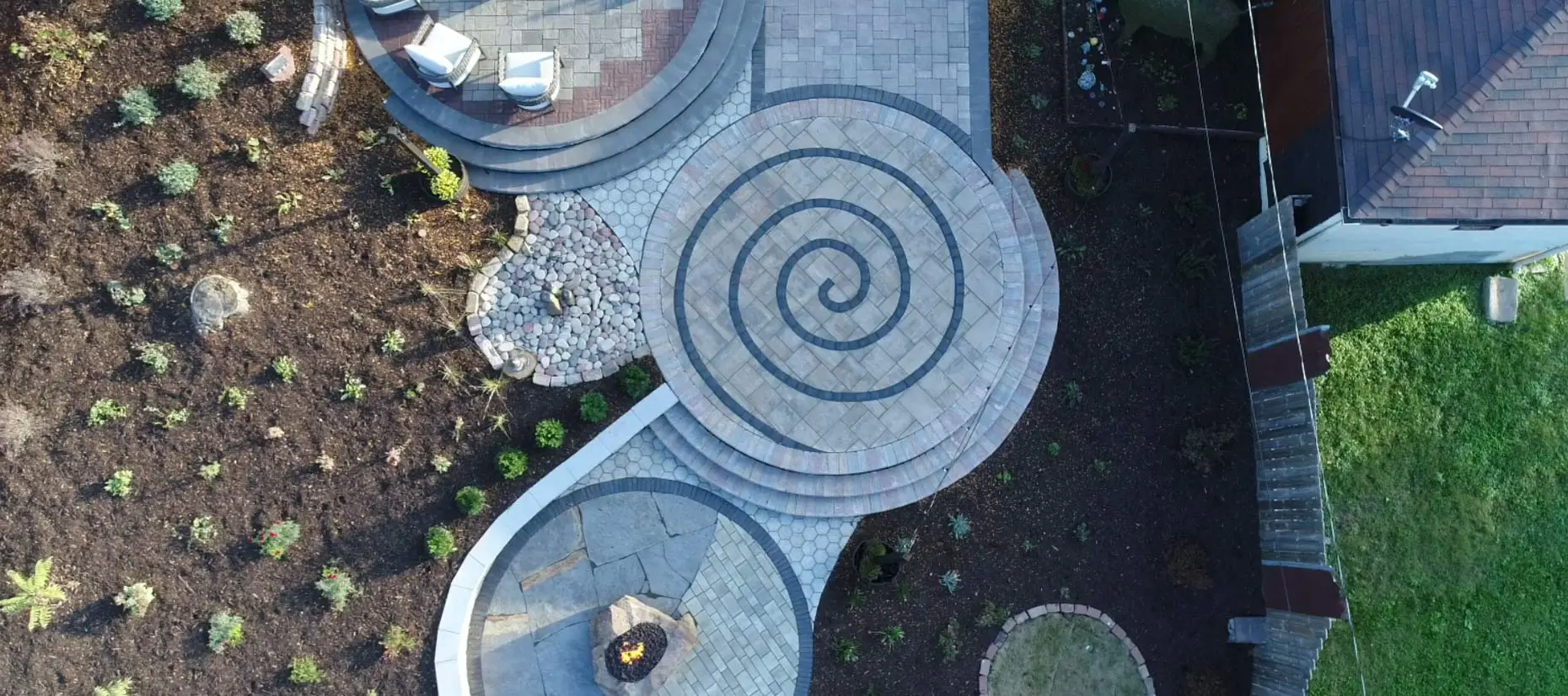 Drone shot of a patio with a spiral design in Omaha, NE.