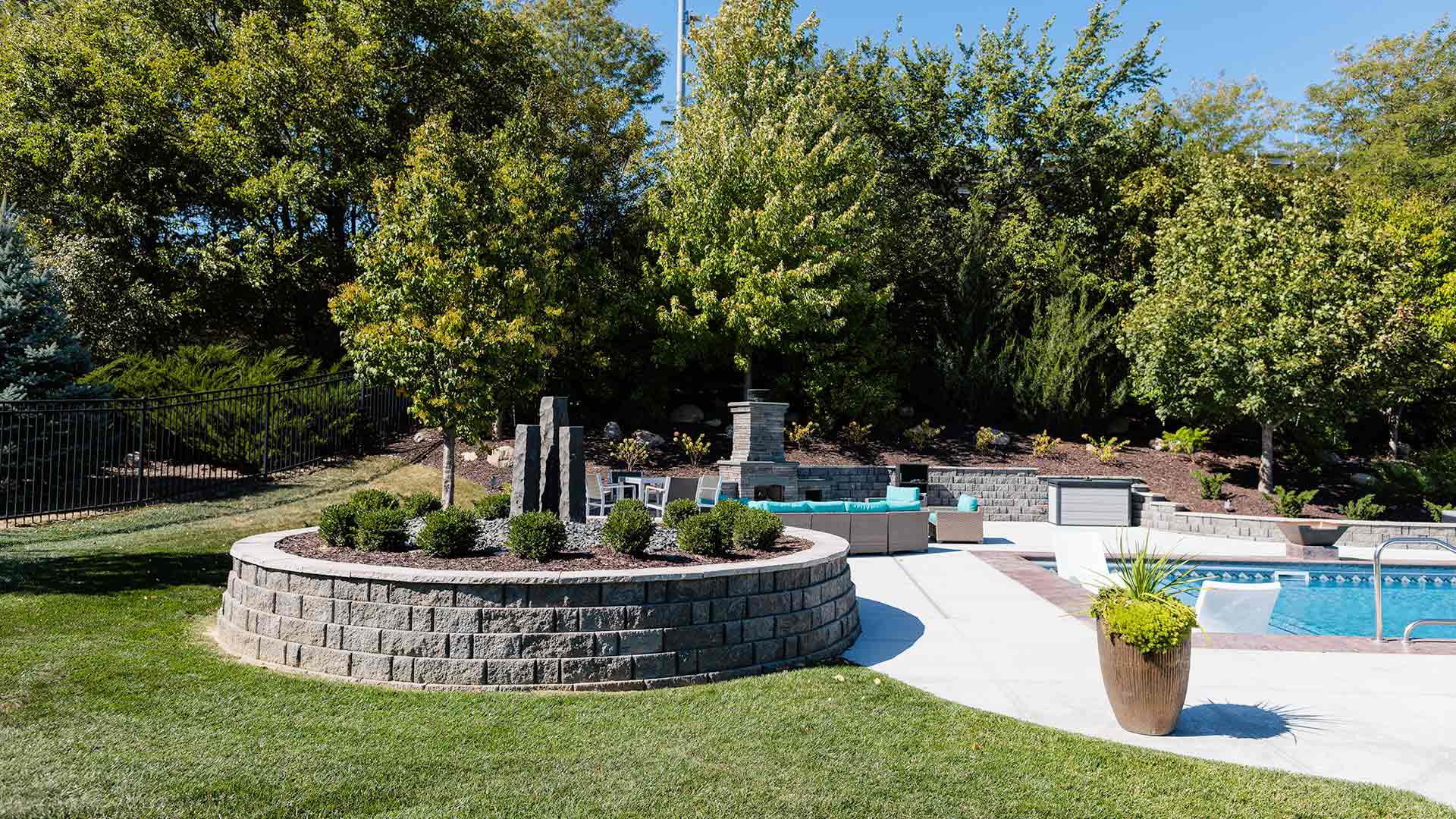 Backyard Project in Omaha, NE Includes a Pool, Retaining Wall, Landscaping & More
