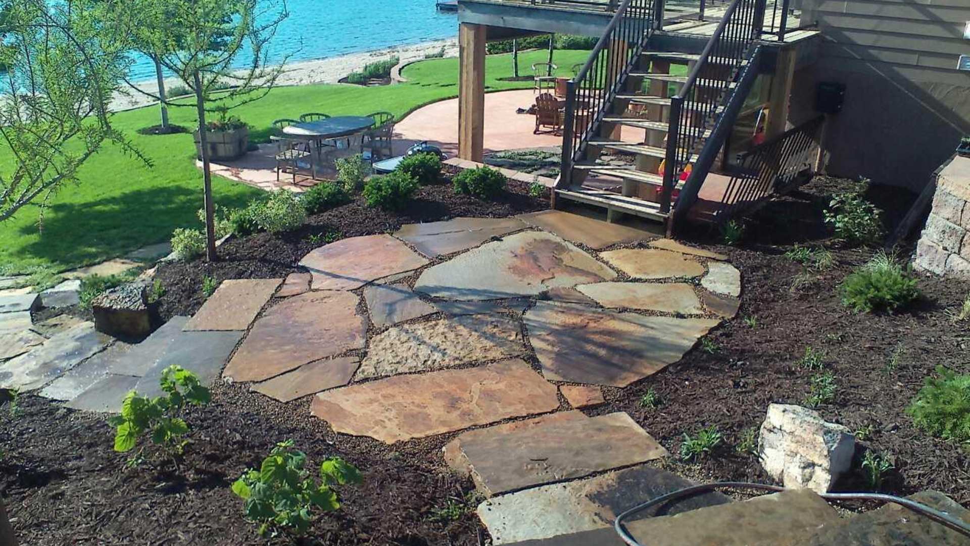Paver patio with natural stone installed for client's in Papillion, NE.
