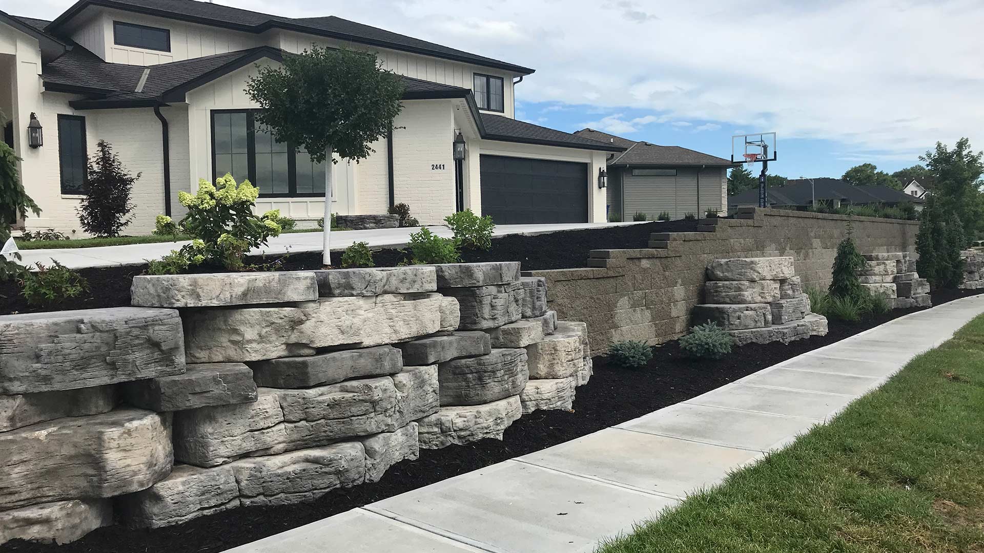 Unique retaining wall installed at a home in Omaha, NE.