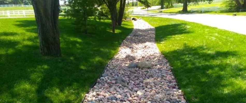 Dry creek bed installed for home front in Ralston, NE.