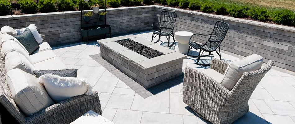 Fire table installed over a paver patio in Omaha, NE.