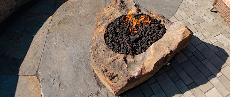 Flaming fire pit installed in La Vista, NE.