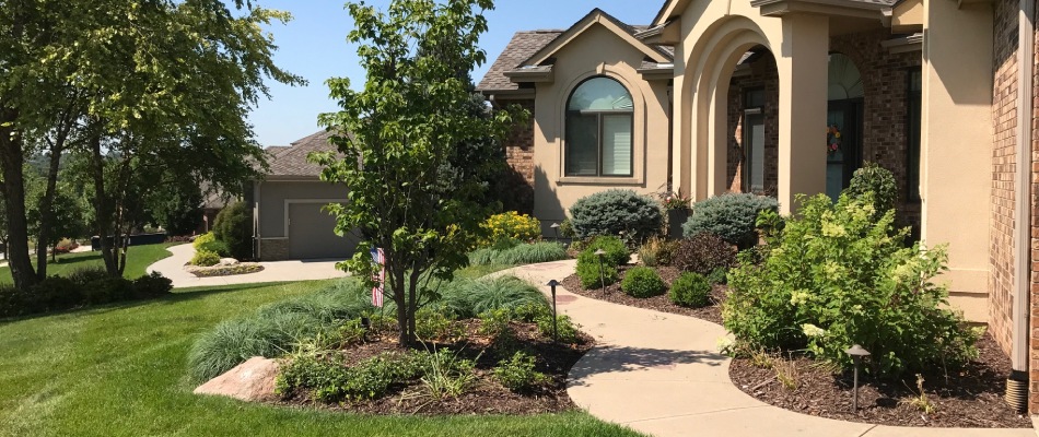 Maintained landscape bed for home front in Ralston, NE.