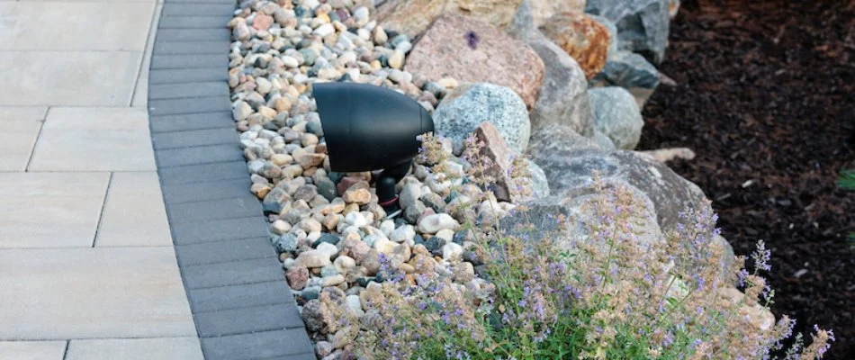 Outdoor lighting next to a pool deck in Omaha, NE.