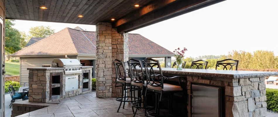 A modern outdoor kitchen and bar area in Papillion, NE. 