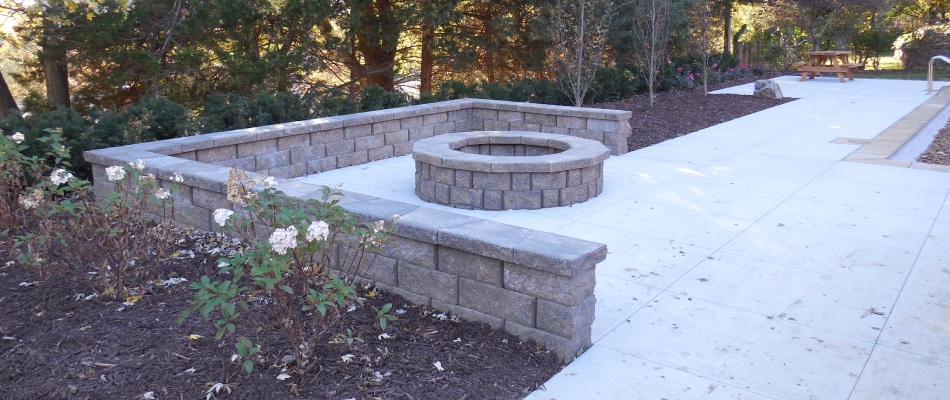 Seating wall installed by fire pit in Ralston, NE.